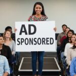 an-influencer-holding-up-a-sign-that-clearly-says